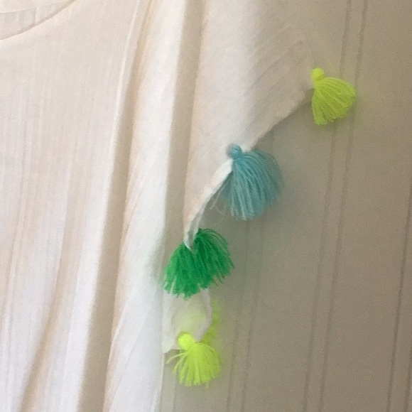 Lolli White cotton cover up with multi colored fringe. - Picture 2 of 7